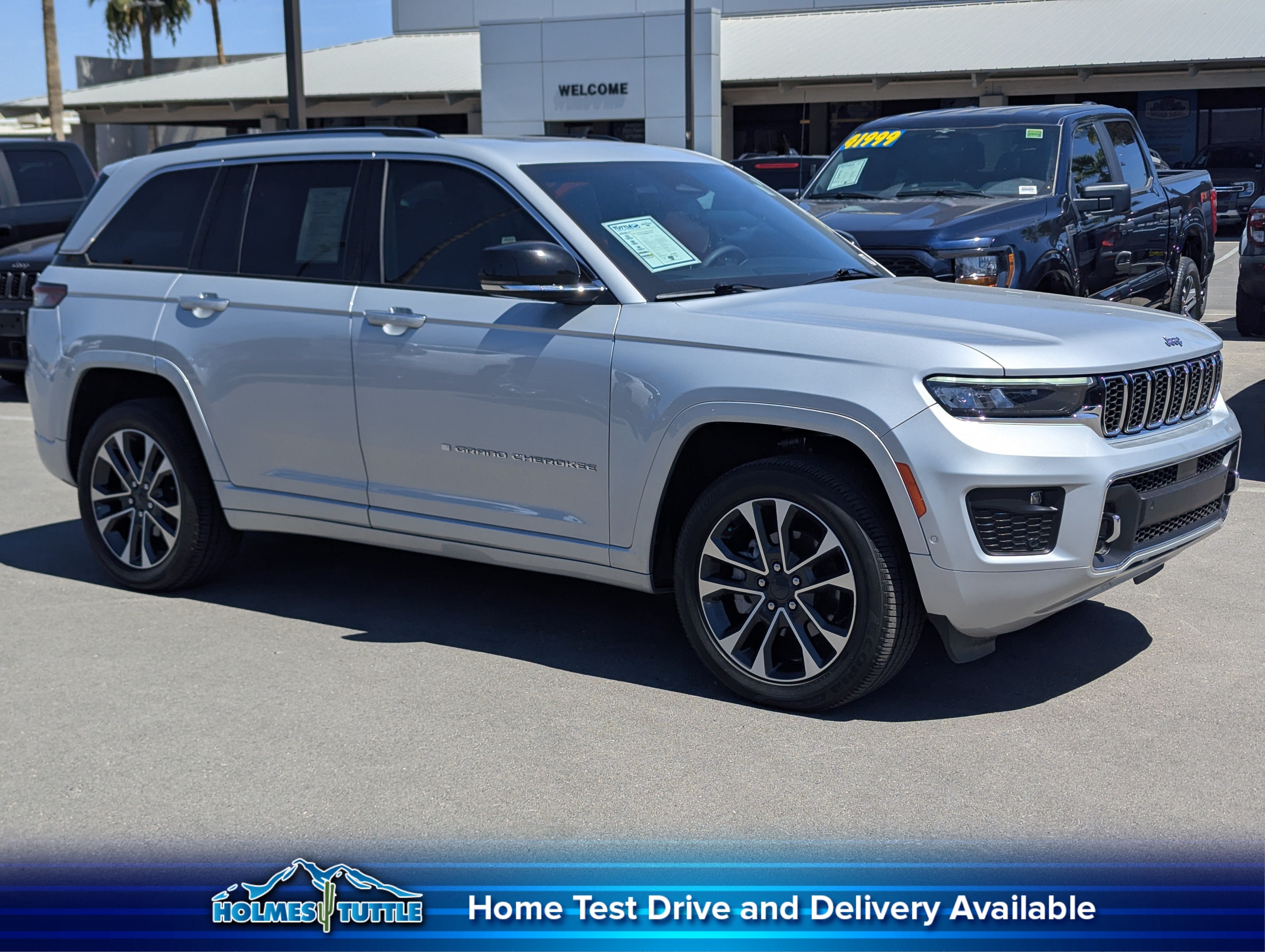 2024 Jeep Grand Cherokee Overland in Silver Zynith — front three-quarter view