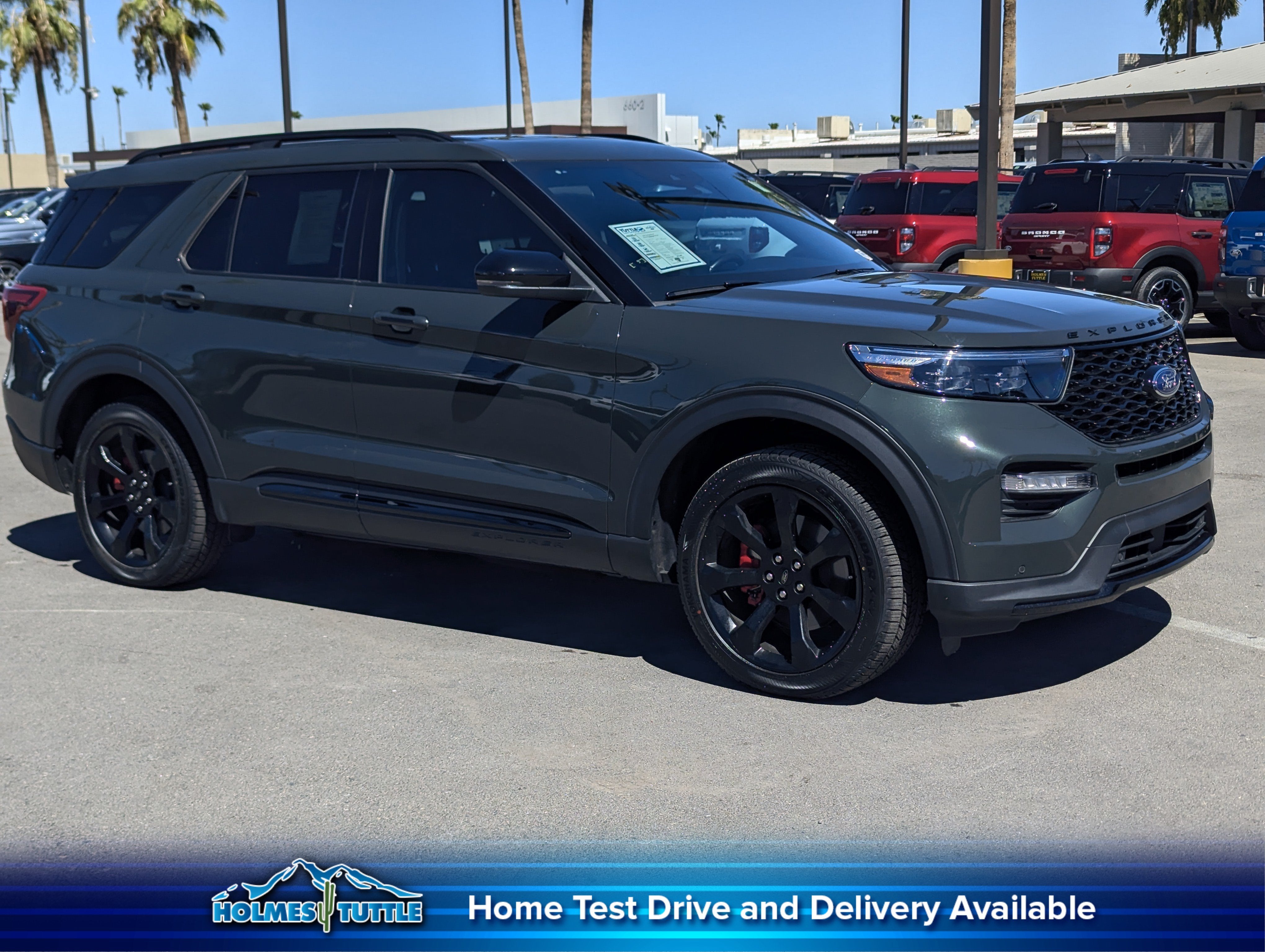 2024 Ford Explorer ST in Forged Green Metallic — front three-quarter view