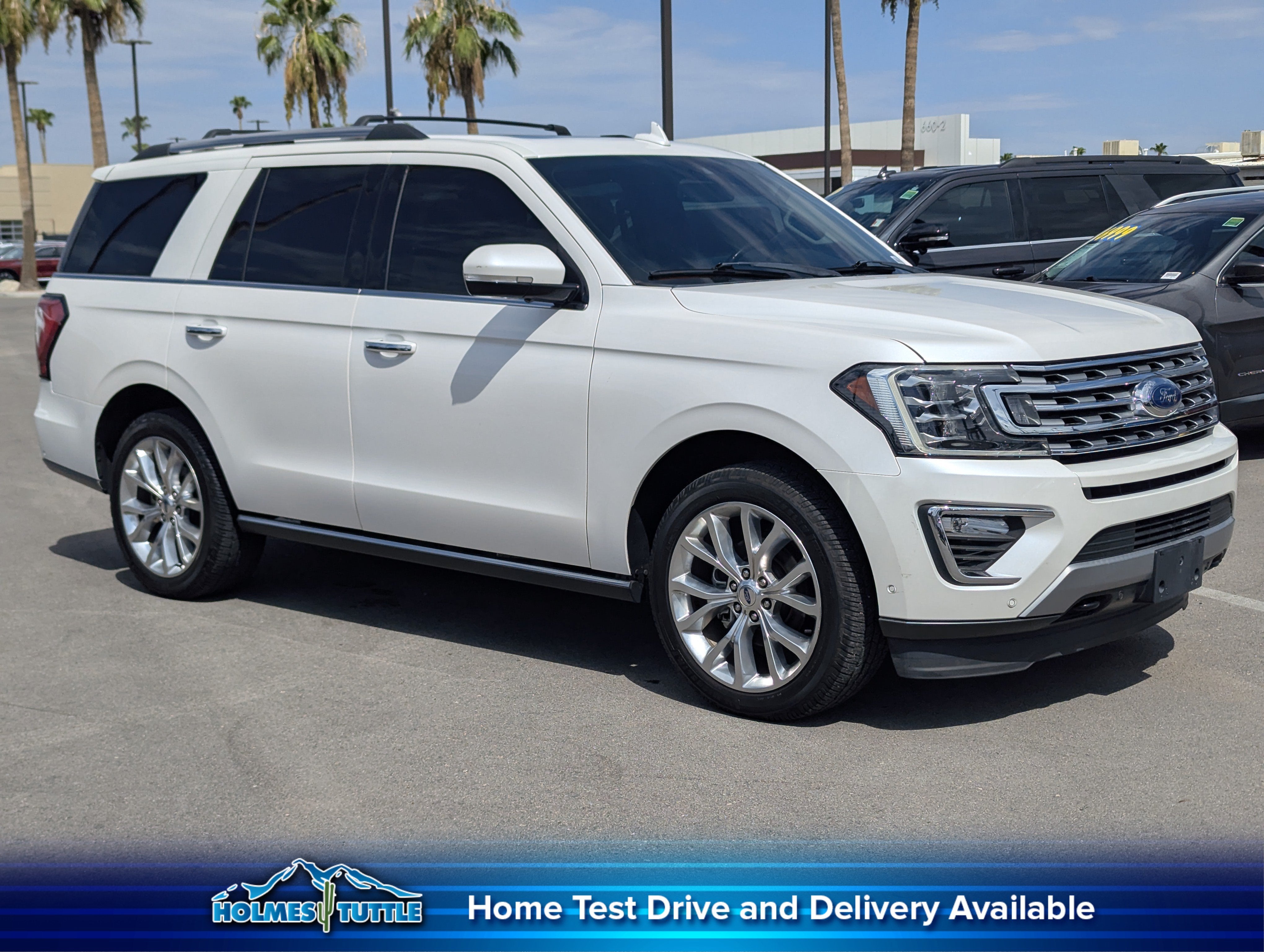 2019 Ford Expedition Limited in White Platinum Metallic Tri-Coat — front three-quarter view