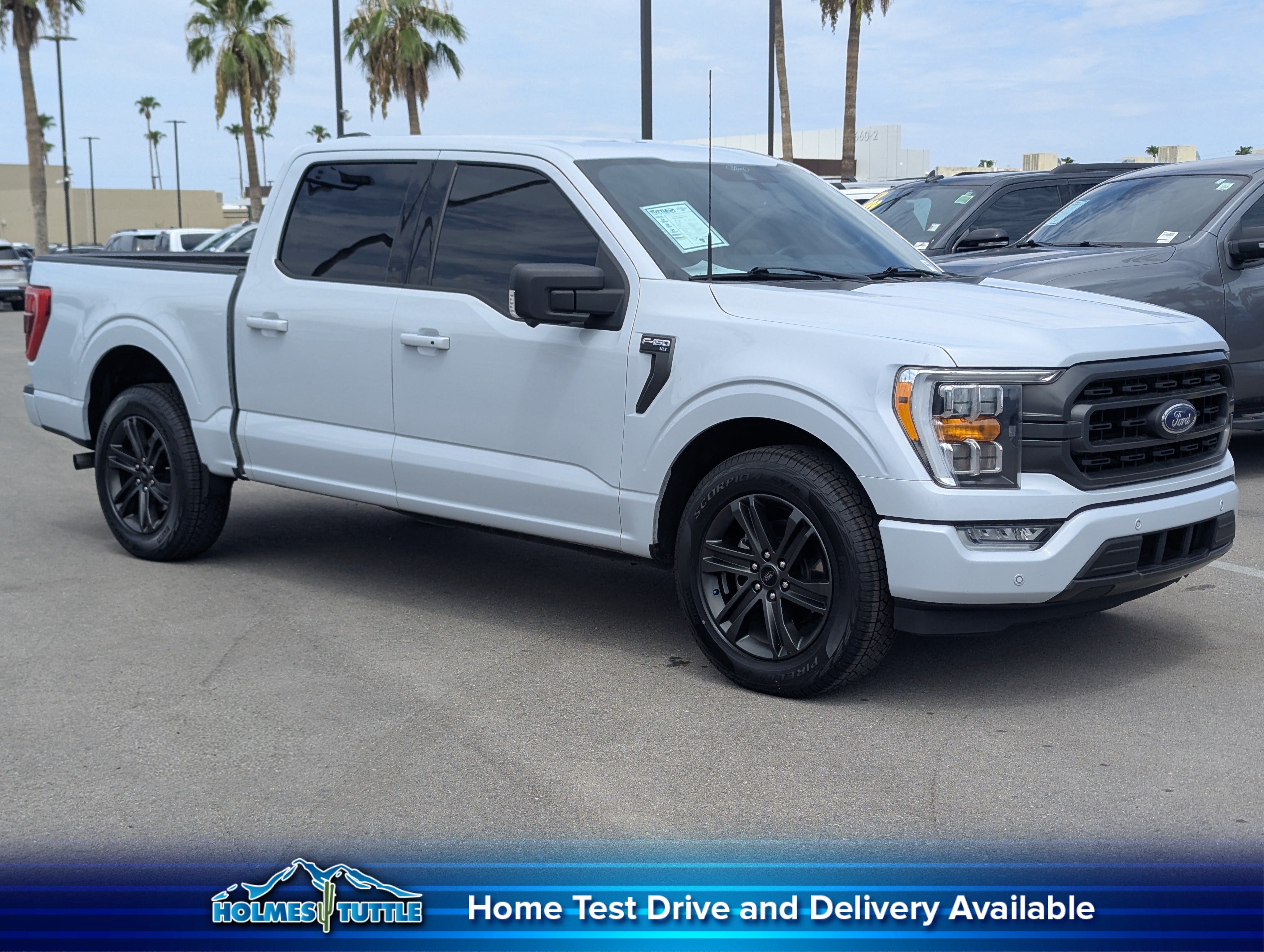 2021 Ford F-150 XLT in Space White Metallic — front three-quarter view