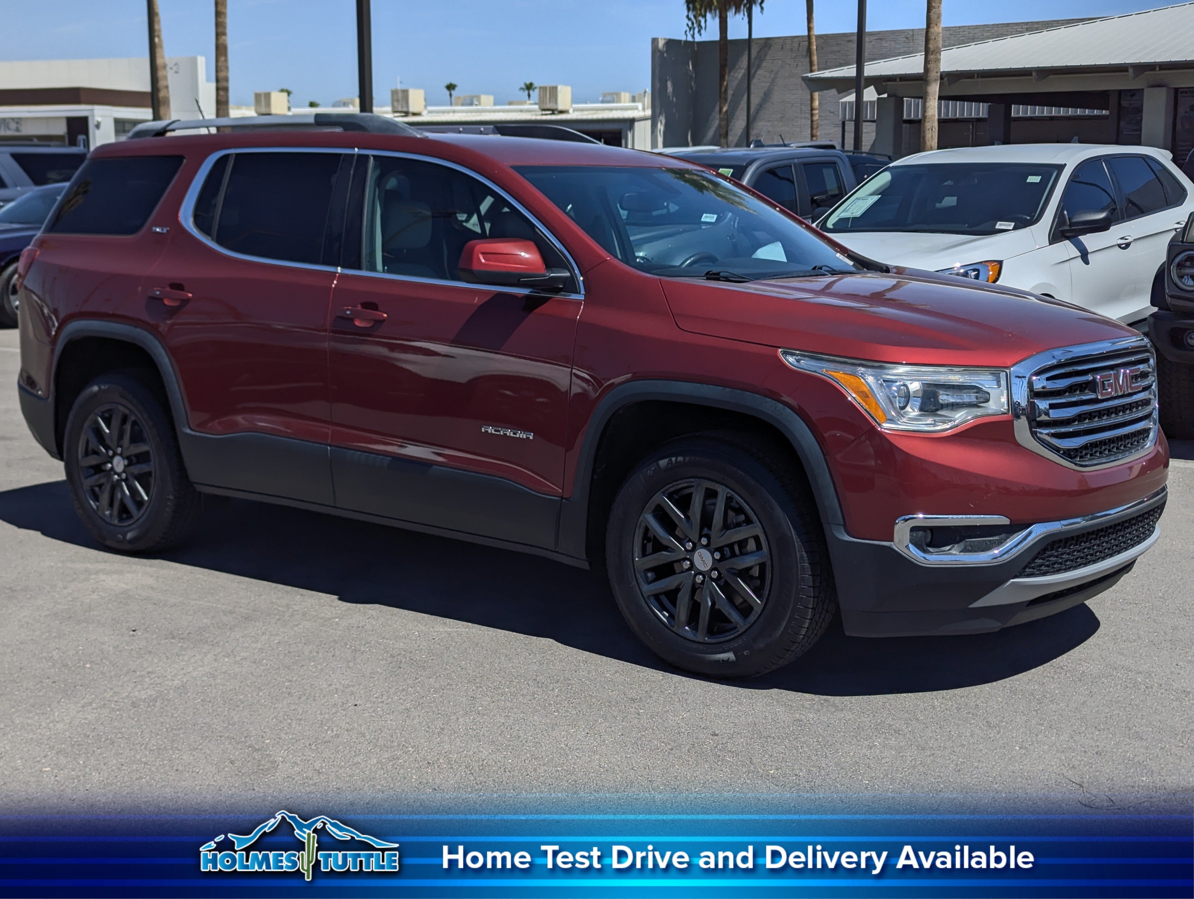 2019 GMC Acadia SLT in Red Quartz Tintcoat — front three-quarter view