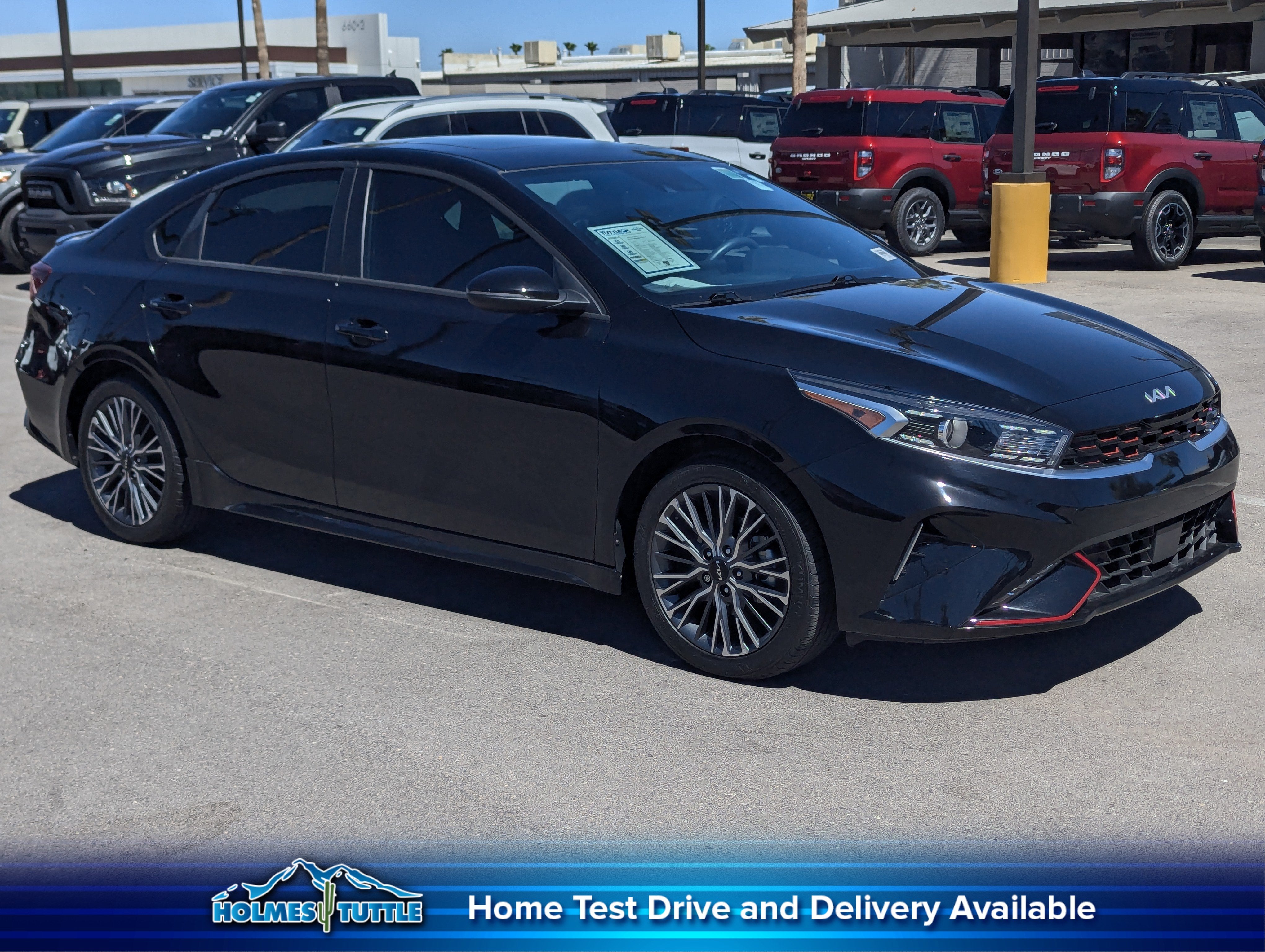 2024 Kia Forte GT-Line in Aurora Black — front three-quarter view