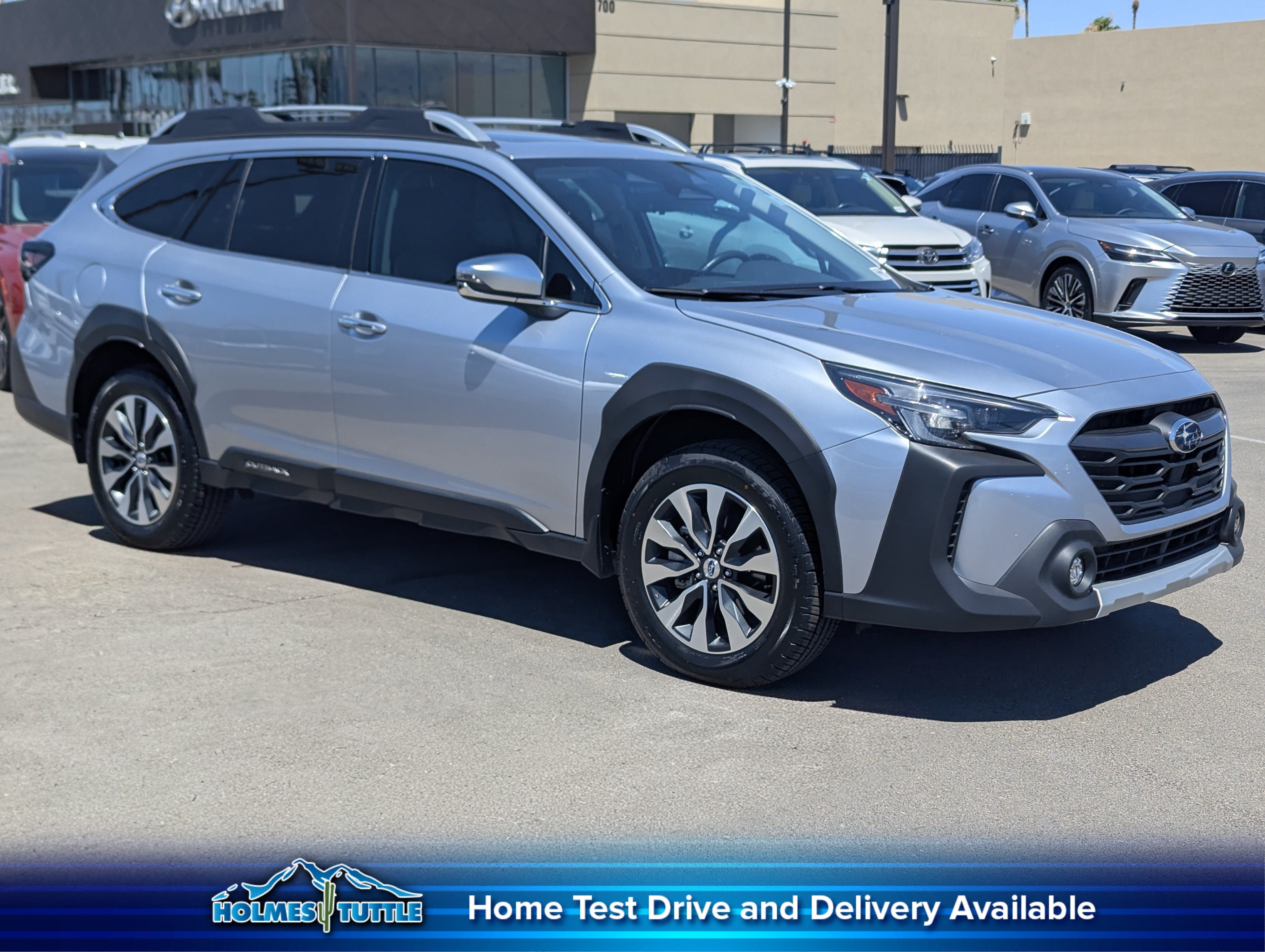 2023 Subaru Outback Touring XT in Ice Silver Metallic — front three-quarter view