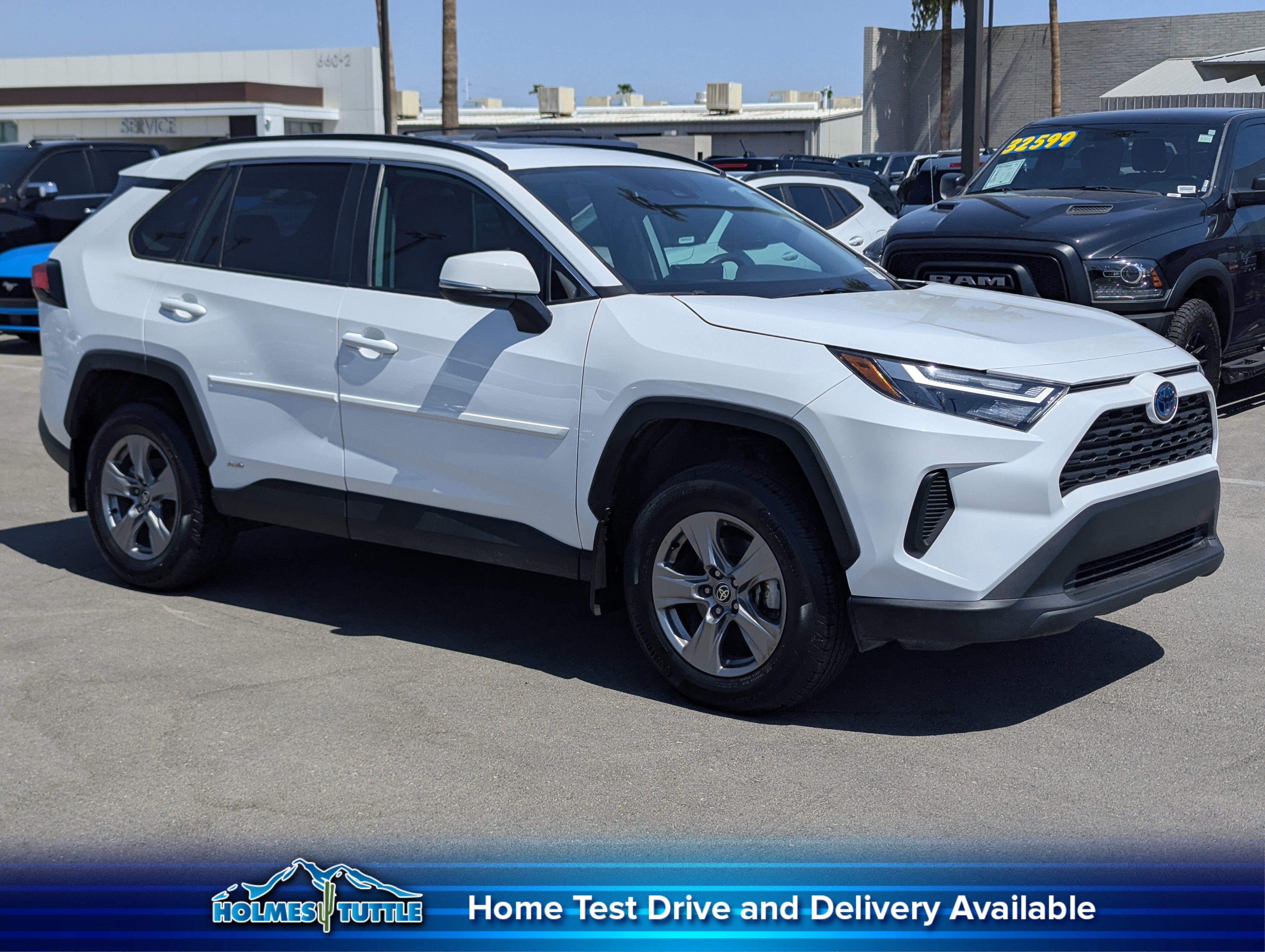 2024 Toyota RAV4 Hybrid XLE in Ice Cap — front three-quarter view
