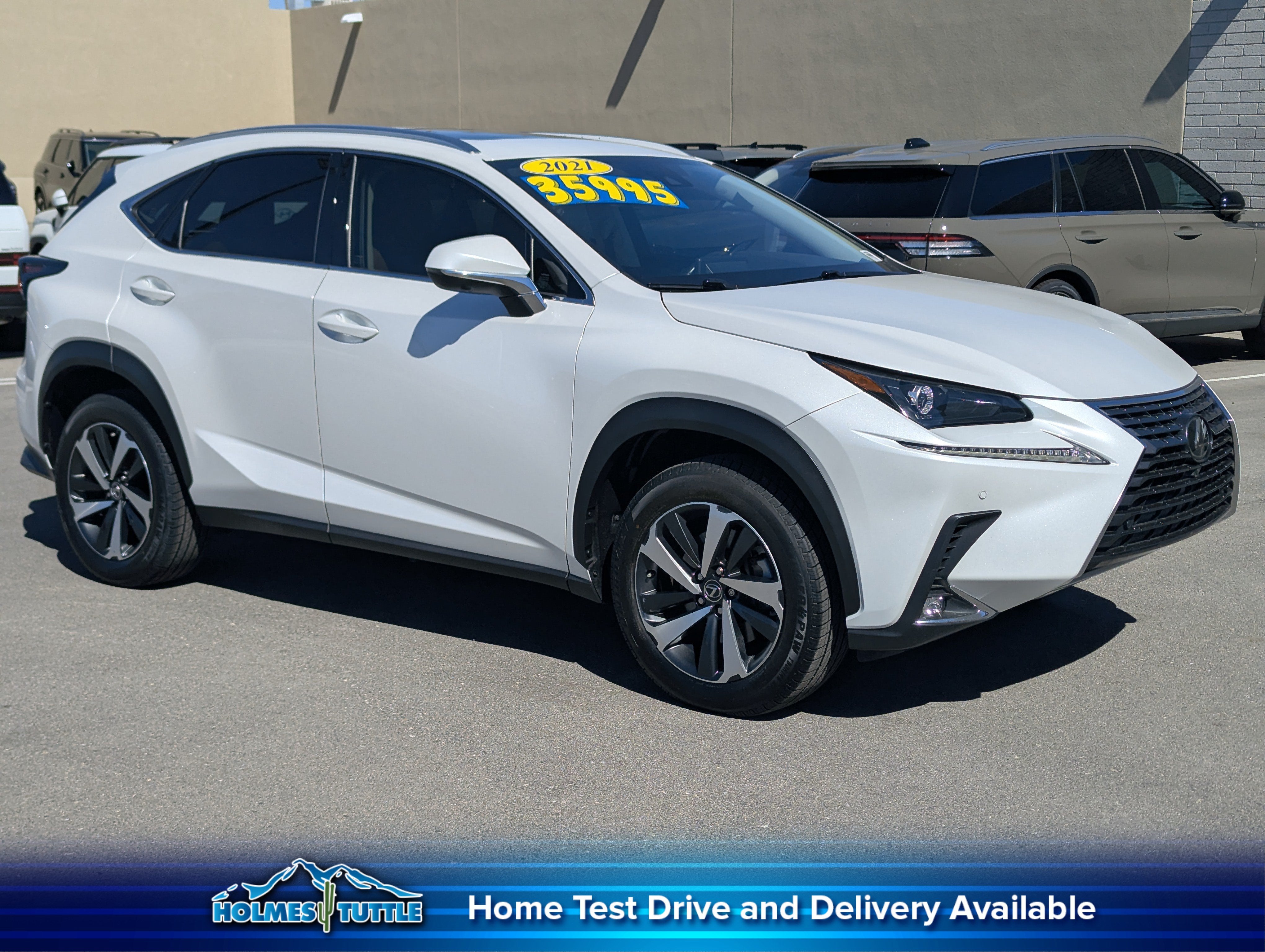 2021 Lexus NX NX 300 in Eminent White Pearl — front three-quarter view